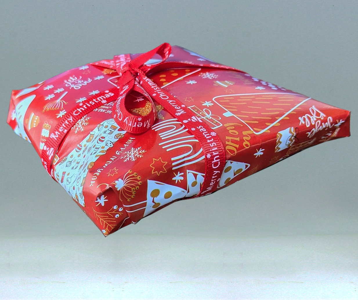 Festive wrapping paper with ribbon